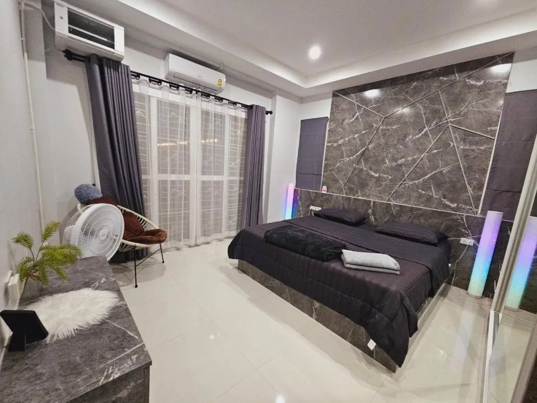 ห้องนอน Mana Pool Villa