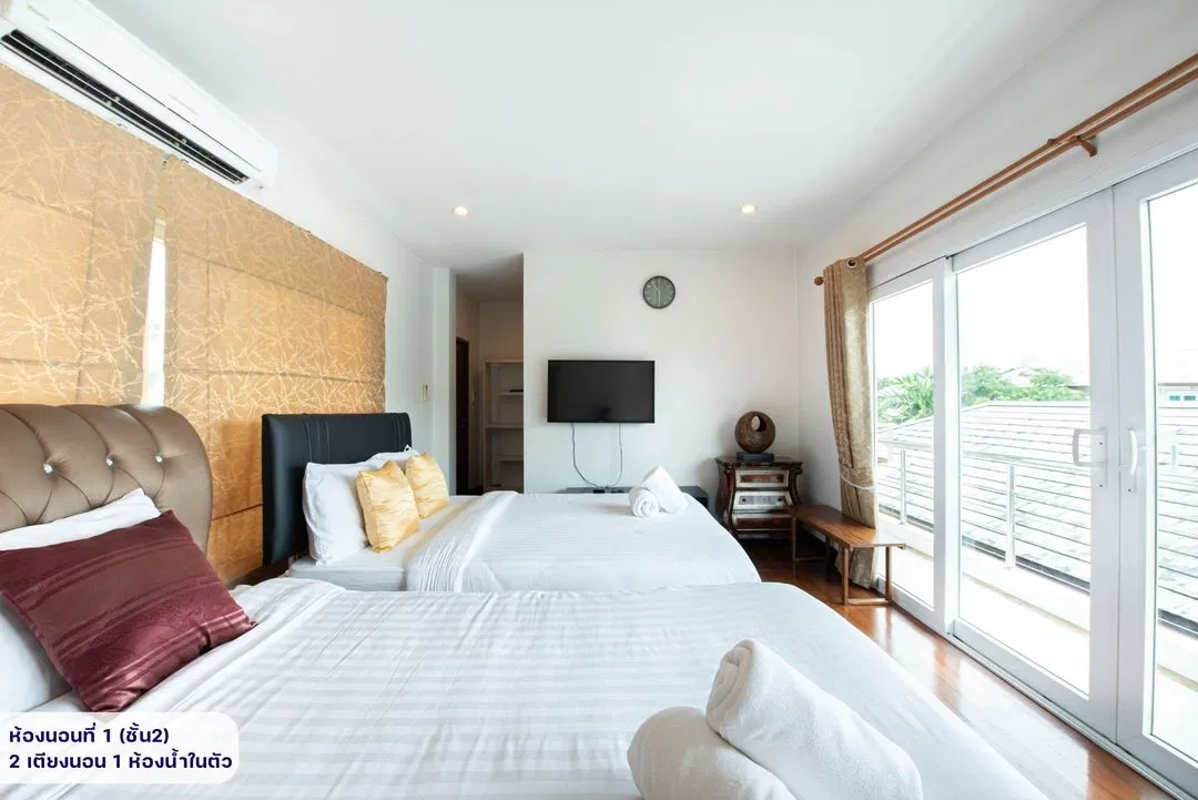 ห้องนอน Cozy Breeze Pool Villa