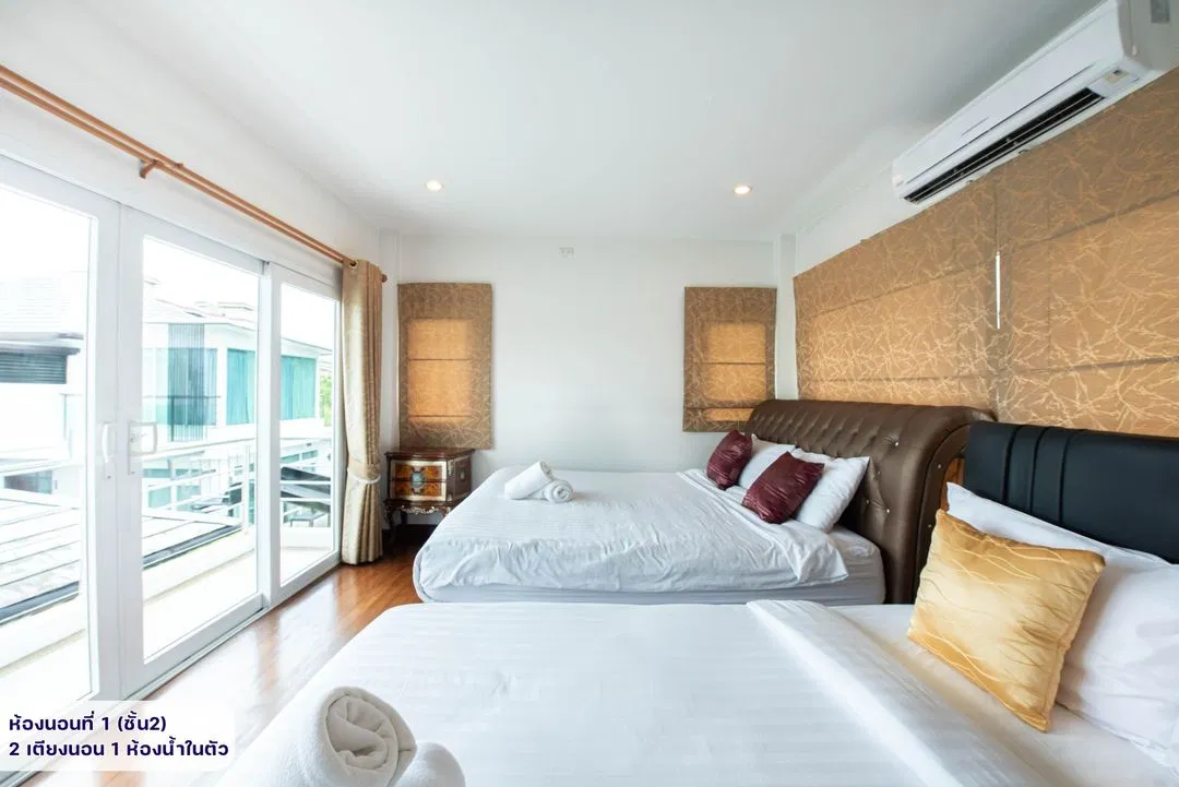 ห้องนอน Cozy Breeze Pool Villa