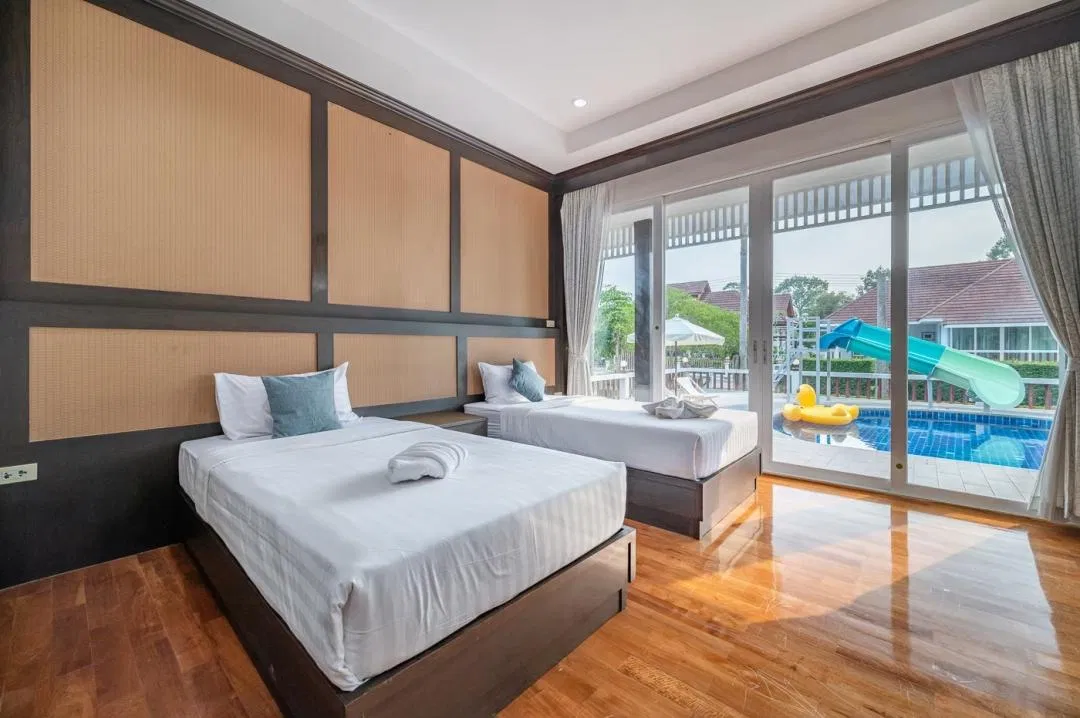 ห้องนอน RimLay Beachfront Pool Villa